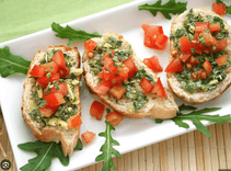 Garlic bread with tomato and pesto